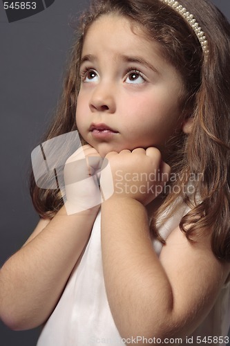 Image of Innocent girl looking up