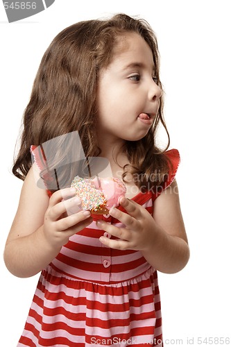 Image of Little girl tasty sweet doughnut
