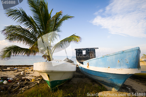 Image of   fishing boats on shore caribbean sea