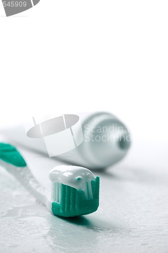 Image of toothpaste and toothbrush