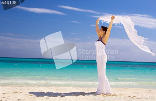 Image of happy woman with white sarong