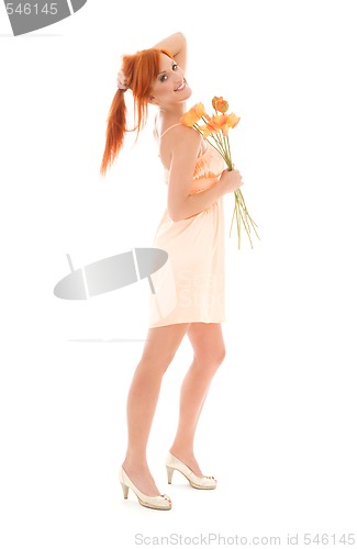 Image of redhead with flowers