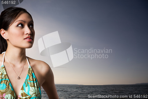 Image of Woman in bikini on beach