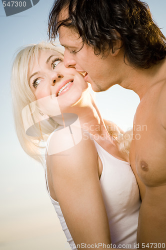 Image of Sensual couple on the beach