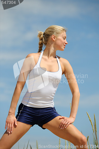 Image of Beautiful sporty female posing