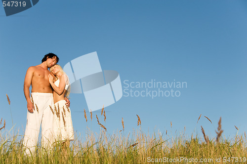 Image of couple on the beach