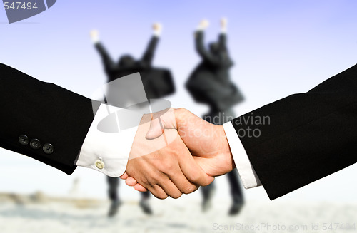 Image of Success businessmen shaking hands