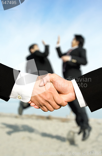 Image of Success businessmen shaking hands