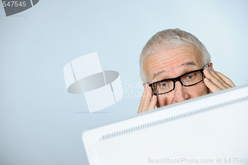 Image of Stressed senior businessman