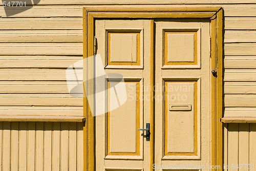 Image of Yellow wooden door