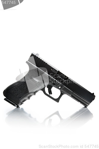 Image of handgun with natural reflection