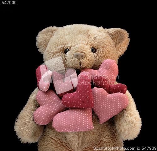 Image of teddy bear with hearts
