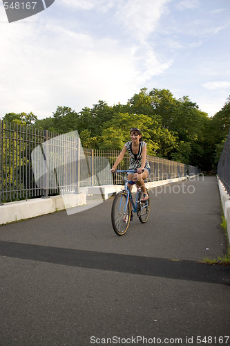 Image of Girl Riding Her Bike