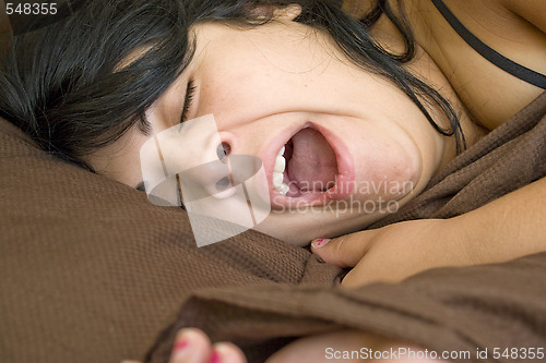 Image of Sleepy Yawning Woman