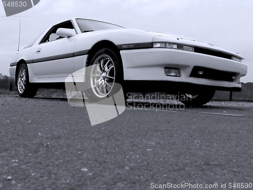 Image of White Import Sports Car 80s