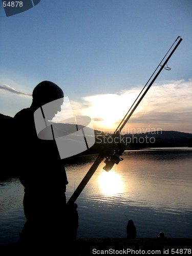 Image of Angler in the sunset