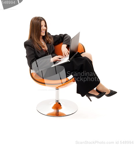 Image of businesswoman in chair with laptop