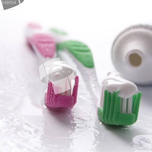 Image of toothpaste and toothbrushes