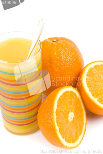 Image of glass of juice and oranges