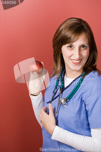 Image of Nurse With An Apple