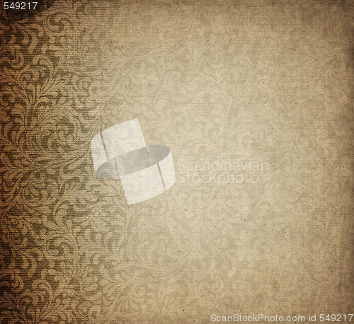 Image of old paper with paisly design