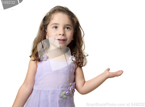 Image of Pretty smiling girl showing hand outstretched