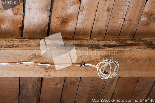Image of Wooden ceiling, electric wire