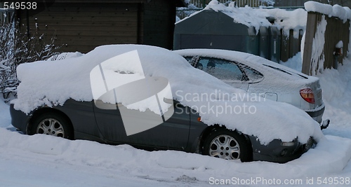 Image of Cars covered in snow