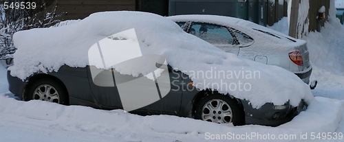 Image of Cars covered in snow