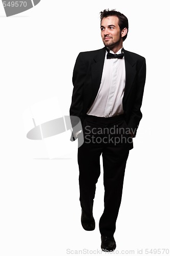 Image of Man in tuxedo stepping out