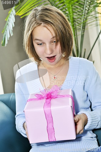 Image of Teenage girl with present