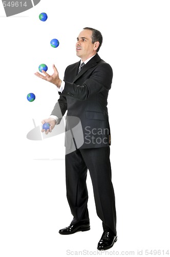 Image of Businessman juggling