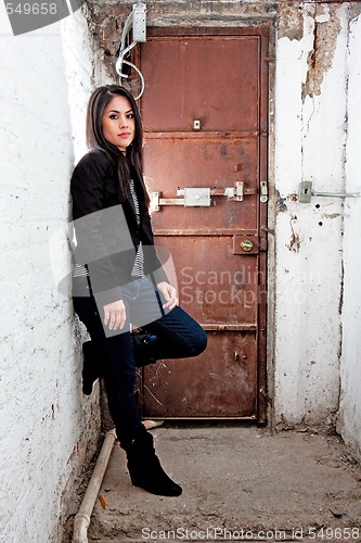 Image of Girl in front of door