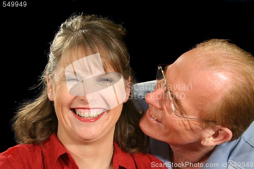 Image of Middle Aged Couple Playing