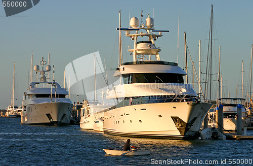 Image of Row Boat VS Superyacht