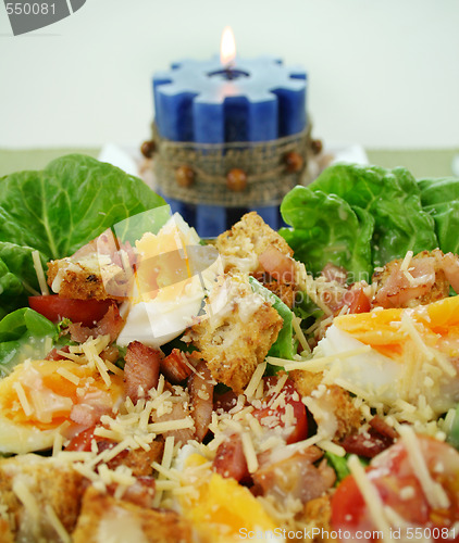 Image of Caesar Salad And Candle