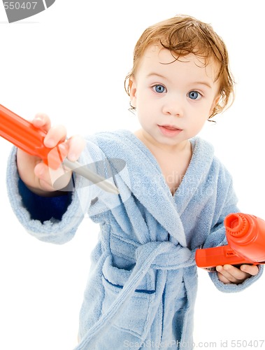 Image of baby boy with toy tools
