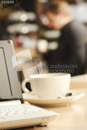 Image of Laptop on the coffee table