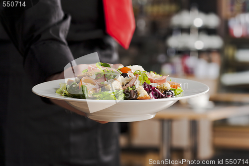 Image of Salad and waiter