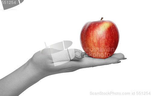Image of red apple in  hand