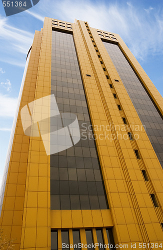 Image of yellow skyscraper