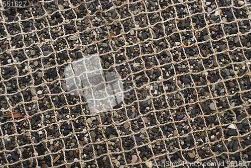 Image of net and pebble sand