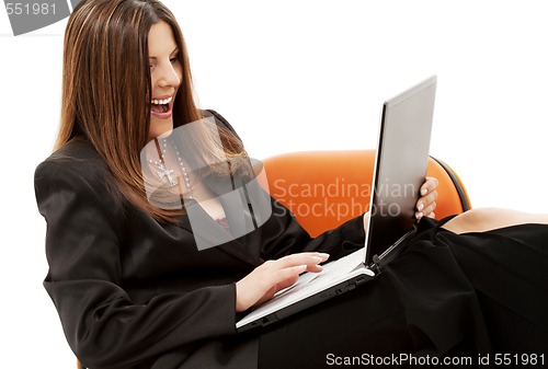 Image of businesswoman in chair with laptop