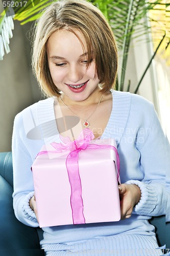 Image of Teenage girl with present