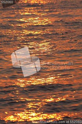 Image of sea water texture at sunset