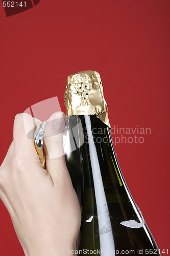 Image of Opening champagne bottle