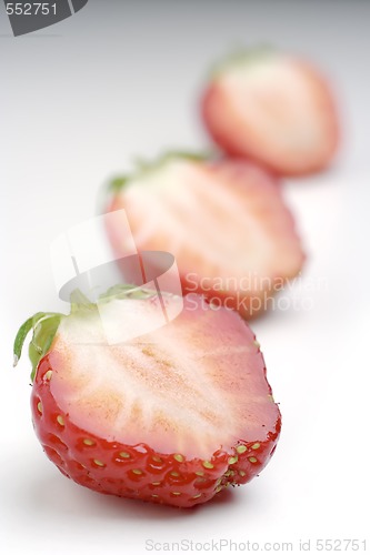 Image of three halfs of strawberries