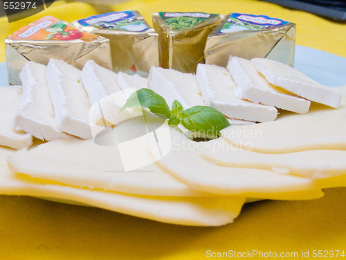 Image of Assortment of delicious cheese on a cheese board