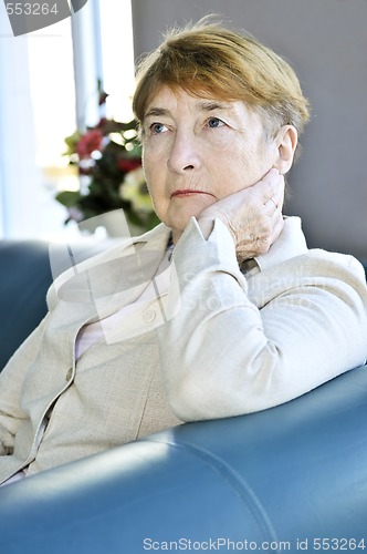 Image of Sad elderly woman