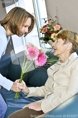 Image of Granddaughter visiting grandmother